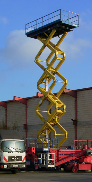 A large scissor lift in extended position.
